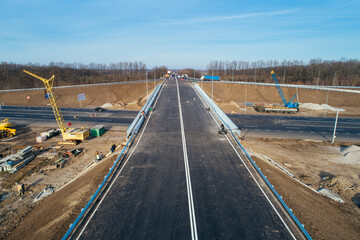 Aerial view asphalt road and green forest, Forest road going through forest with car adventure view from above, Ecosystem and ecology healthy environment concepts and background.
