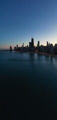 city skyline at night Chicago water 