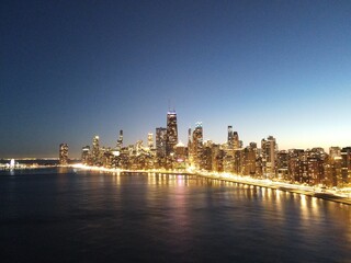Naklejka na ściany i meble Aerial view of the city of Chicago, Illinois, USA at dusk.