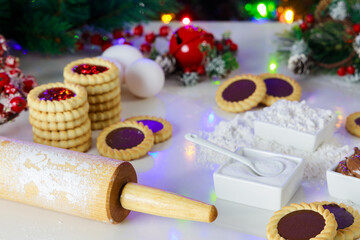 Obraz na płótnie Canvas Christmas cookies made with jam and hazelnut spread.