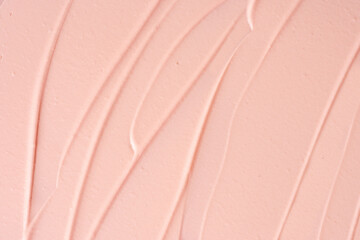 Pink cosmetic clay strokes background. Pink cleanser cosmetic smudge backdrop. Pink clay cosmetic...