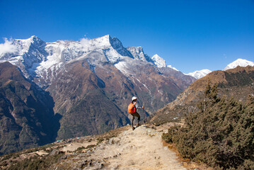 Trekking to Everest Base Camp under Cholatse and Taboche peaks, Khumbu, Nepal