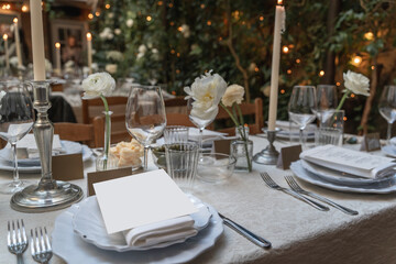 Romantic candlelit table setting inside a pre-war, red brick Italian restaurant. 