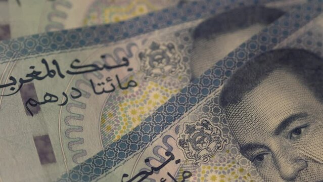 Casablanca, Morocco - 20 December 2022 : Moroccan money texture. 200 Dirhams bills paper. Rotative close-up