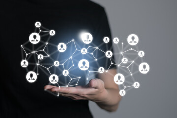 . Virtual visualization of network chain with person icons, female unrecognised manager on background. Human capital and teambuilding concept.