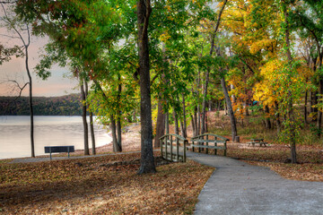 The picnic area at the Lake of the Ozarks State Park on a fall afternoon with trees in peak foliage. 