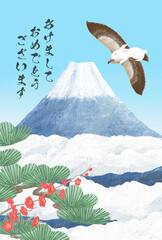 富士山と鷹に乗ったうさぎと梅や松と共に新年おご挨拶をする年賀状用のイラスト_Happy new year