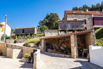 Fototapeta na wymiar Beautiful village of Lira in Spain, unique for its horreos, traditional granary barns