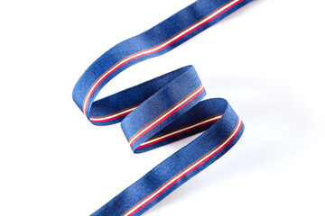 blue ribbon for clothes on a white background