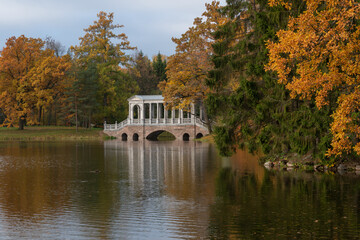 Marble bridge on the shore of a Large pond in the Catherine Park in Tsarskoye Selo on an autumn...
