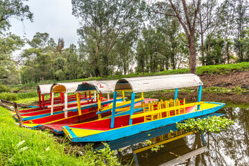 Traditional Mexican trajinera boat in Xochimilco channels and lake of Xochimilco floating in Mexico...