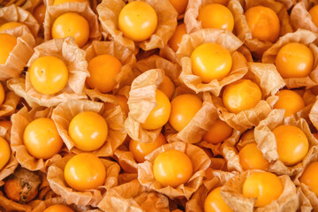 Thai cape gooseberries tropical yellow fruit  top view background