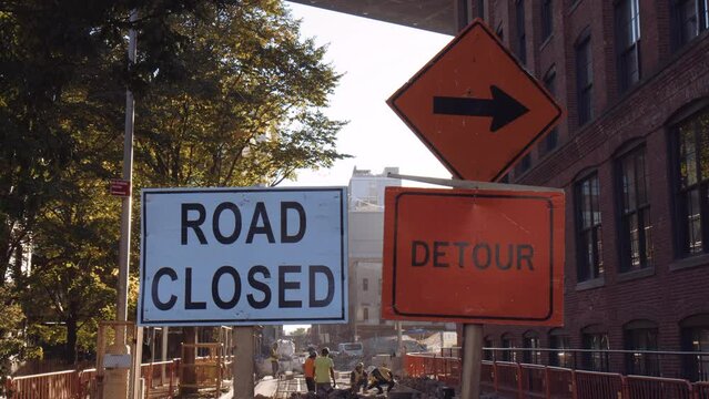 Road closed and Detour signs in streets of New York City, close up