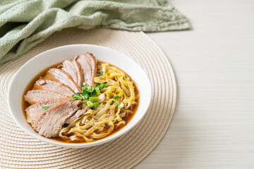 egg noodles with stewed duck in brown soup