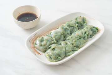 steamed chives dumplings with sauce