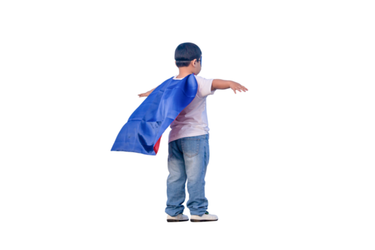 Portrait of adorable kid boy having fun outdoor. Little child play superhero