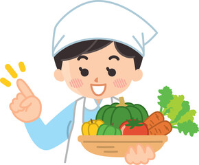 野菜を持った調理師の女性