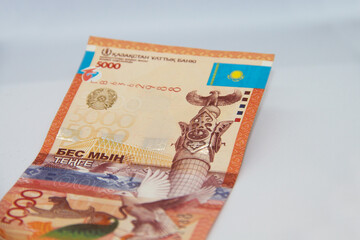 Fototapeta na wymiar Five thousand tenge banknote close-up. Tenge paper currency design.