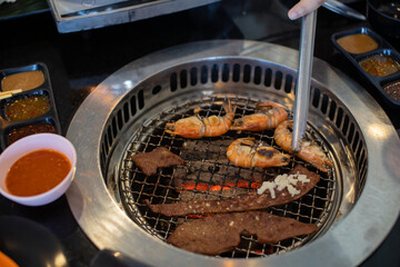 Smoked prawns cooked on a shabu grill rack