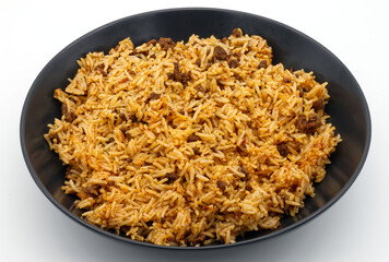 Basmati Rice with bolognese sauce in a black dish.