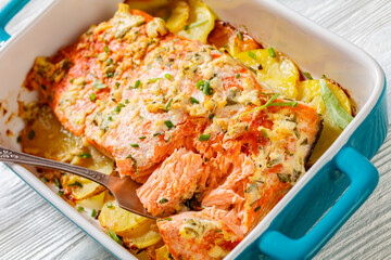 salmon with potato and tarragon sour cream sauce