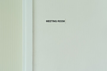 Sign of meeting room on the wall
