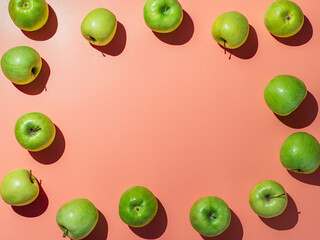 Bright backgroud with apples, copy space in center