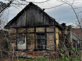 Old timeworn rustic house, typical architectural style for 19th century architecture in Vojvodina, Serbia
