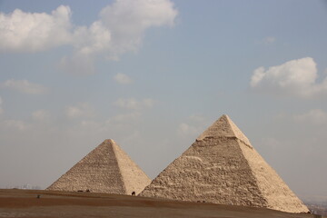 Fototapeta na wymiar The Pyramid of Khafre and the Great Pyramid of Khufu, Giza Pyramids complex, Cairo, Egypt.