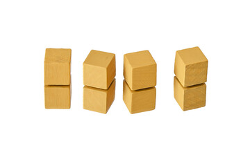 Obraz premium Wooden cubes on a white background. Four identical cubes lie, stand in a row together and separately, directly and at an angle. Place for text