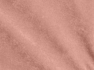 rose gold color velvet fabric texture used as background. Empty pink gold fabric background of soft...