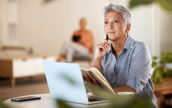 Office, thinking and mature woman with idea for creative startup business or schedule planning in notebook at desk. Freelance worker, designer or writer, pen in hand working on ideas in modern office