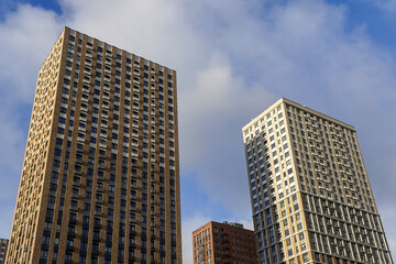 Fototapeta na wymiar Modern high rise apartment buildings, real estate and rental property concept