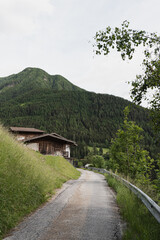 Fototapeta na wymiar Scenic view of mountain road, countryside village. Landscape