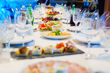 snacks and empty wine glasses on the table. catering 