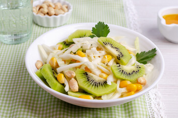 Fresh vegetables salad with kiwi