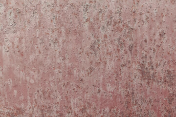 A tinny old painted wall with corrosion. Abstract detailed texture background. Weathered surface with damages.