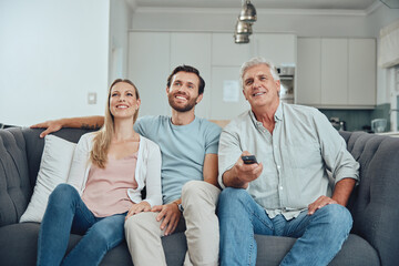 Obraz premium Watching tv, family and home of a couple with grandparent streaming a movie happy on a sofa. Television, living room and video watching of people on a family home couch with technology and happiness