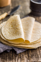 Mexican Corn Tortillas on wooden table.