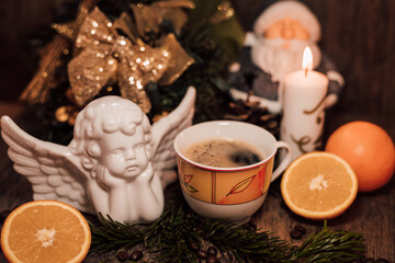 Christmas composition coffee beans, orange, wine, candle. New Year's table