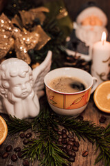 Christmas composition coffee beans, orange, wine, candle. New Year's table
