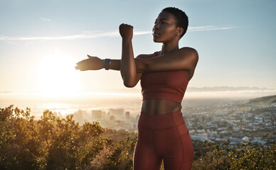 Fitness, hiking and black woman on mountain stretching, meditation and training in nature for...