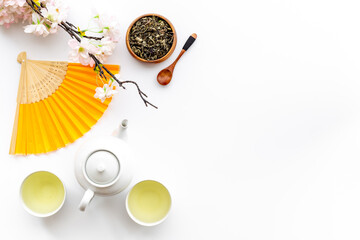 Obraz na płótnie Canvas Asian tea ceremony with a fan. Chinese background