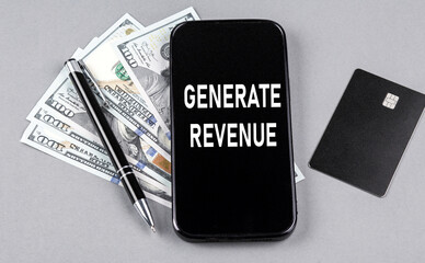 Credit card and text GENERATE REVENUE on smartphone with dollars and pen. Business concept