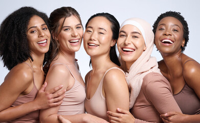 Portrait, beauty and diversity with woman friends in studio on a gray background together for inclusion. Happy, smile and solidarity with a model female group posing to promote real equality