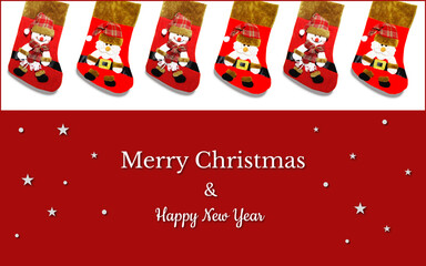 Christmas card with red gift socks, snowman and Santa in a red checkered hats on a white and red.  There are also white stars,  snowflakes and congratulatory inscriptions. It can be used in print...