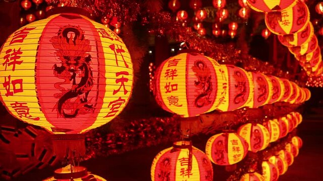 Footage of Chinese Hanging Lanterns with Greeting Words in Rows Displayed as the Lucky Charms During Lunar New Year