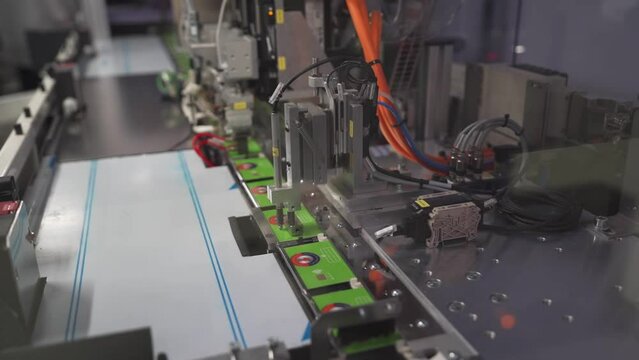 Automated Machine Printing Cards In Publication Factory. closeup