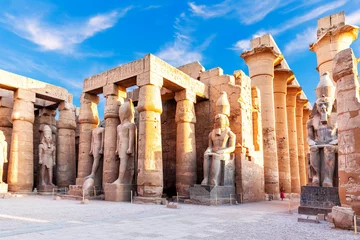 Foto op Plexiglas Beautiful Luxor temple, first pylon ruins near the statues of Ramses II, Egypt © AlexAnton