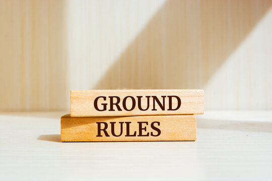 Wooden blocks with words 'GROUND RULES'.